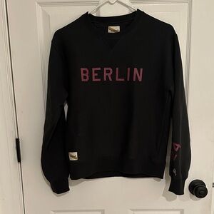 Tracksmith Black Sweatshirt with Pink Berlin Print